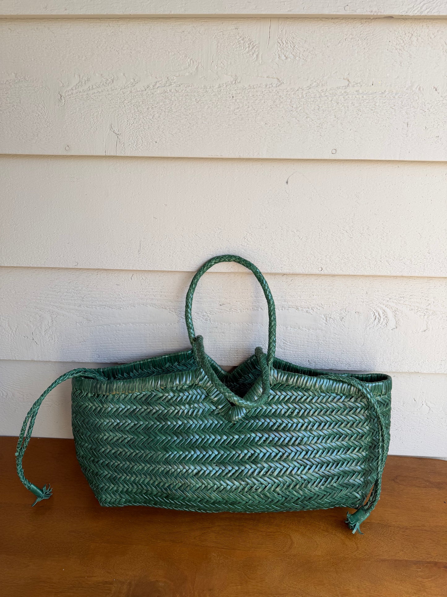 ELETTA handwoven leather bag styled outdoors in natural light